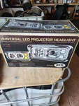 Trux TLED-H100 Chrome Projector Headlight Assy, W/halo Rings (drivers). Fixed Price $450.00.
