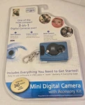 Vivitar Mini Digital Camera With Micro Light Keychain Set. Fixed Price $30.00.
