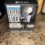 Aconic Smartphone Folding Tripod W/selfie Light 12 Bulb Led Open Box. Fixed Price $12.99.