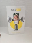 Auto Face Tracking Tripod With 2 Selfie Ring Light, 360 Rotation Body. Fixed Price $15.04.