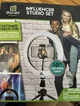 First Act Influencer Studio Set. 10 Ring Light With Phone Holder & Green Screen. Fixed Price $20.00.