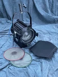 Arri 1000W Plus Fresnel With Barn Doors, Bulb And Two Full Scrims. Fixed Price $225.00.