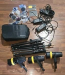 Three Genaray Torpedo BLT-60 Portable Led Focusing Light Kit With Impact Tripods. Fixed Price $399.95.