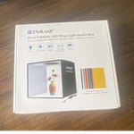 Puluz 25CM Foldable Led Ring Light Studio Box, 12 Color Backgrounds, Usb. Fixed Price $30.00.